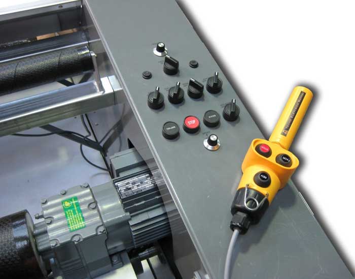 Integrated control panel showing AC drive motor and remote control